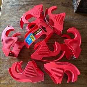Scotch Tape Dispenser Lot of 8 NWT 
Red handheld packing tape dispensers.